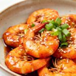 Juicy air fryer teriyaki shrimp glazed with sweet savory sauce and topped with sesame seeds and green onions