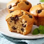 Soft air fryer chocolate chip muffins filled with melty chocolate chips and baked until golden brown