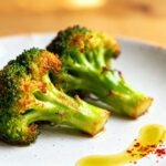 Fresh air fryer broccoli with crispy roasted edges, tender florets, and a light drizzle of olive oil
