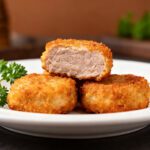 Crispy air fryer pork nuggets with a golden crunchy coating and juicy tender pork inside