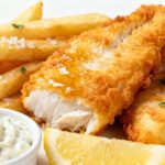 Air fryer cod fish and chips with crispy golden battered cod, crunchy fries, and creamy tartar sauce