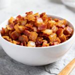 Air fryer bacon bits with crispy golden bacon pieces and rich smoky flavor perfect for toppings and recipes