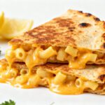 Air fryer mac and cheese quesadilla with creamy macaroni, melted cheddar cheese, and crispy golden tortillas