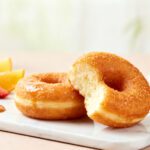 Air fryer Krispy Kreme donuts with a soft fluffy texture, sweet glazed coating, and bakery style flavor