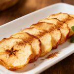 Air fryer cinnamon apple chips made with thinly sliced apples, lightly dusted with cinnamon, and crisped until golden. A sweet and healthy homemade snack.