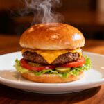 Air fryer Beyond Burger with a juicy plant based patty, melted cheddar style cheese, fresh lettuce, tomato slices, and a toasted bun, served as a satisfying meatless meal.