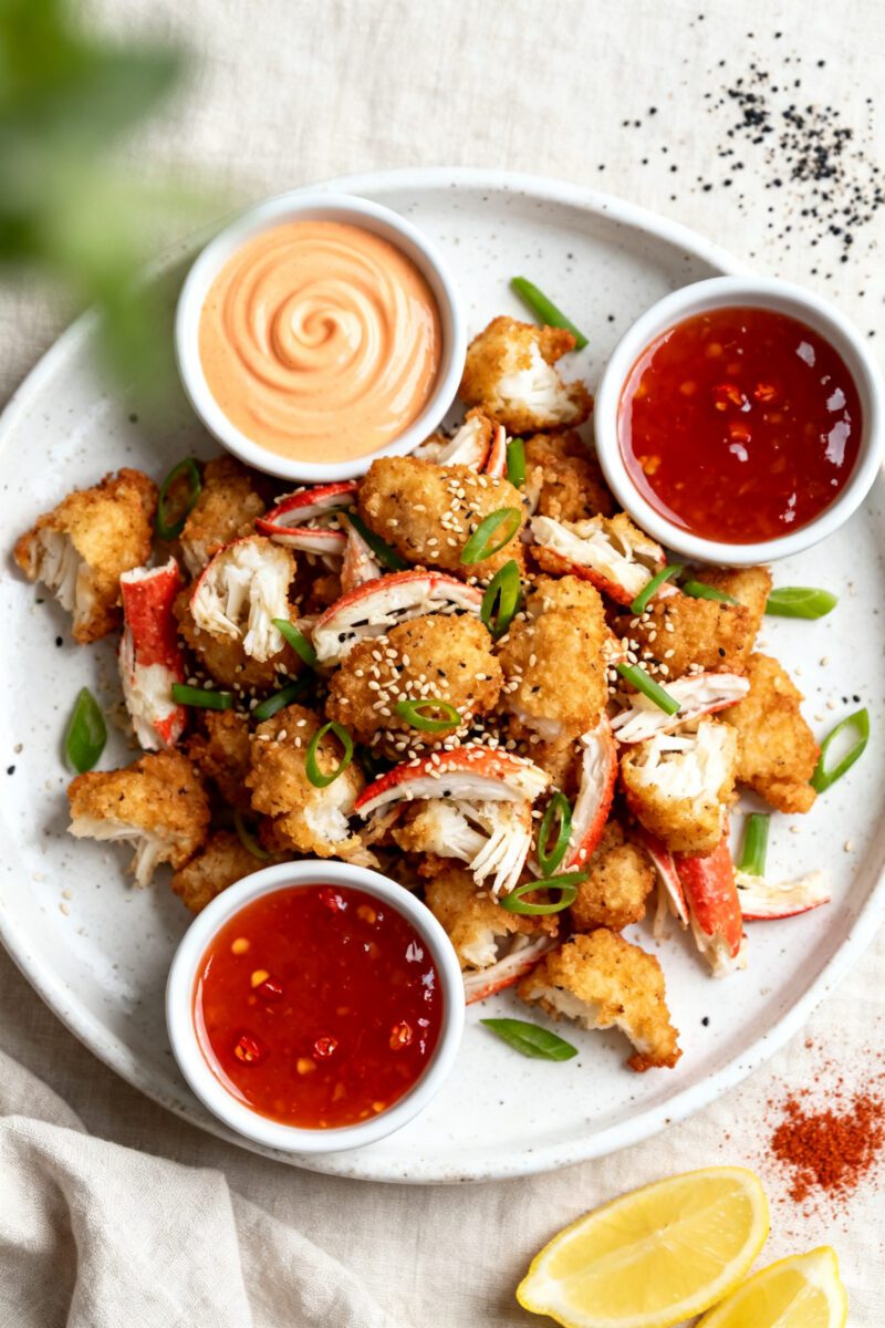 Tasty top view: Overhead shot of a warm appetizer platter of Air Fryer Imitation Crab piled loosely