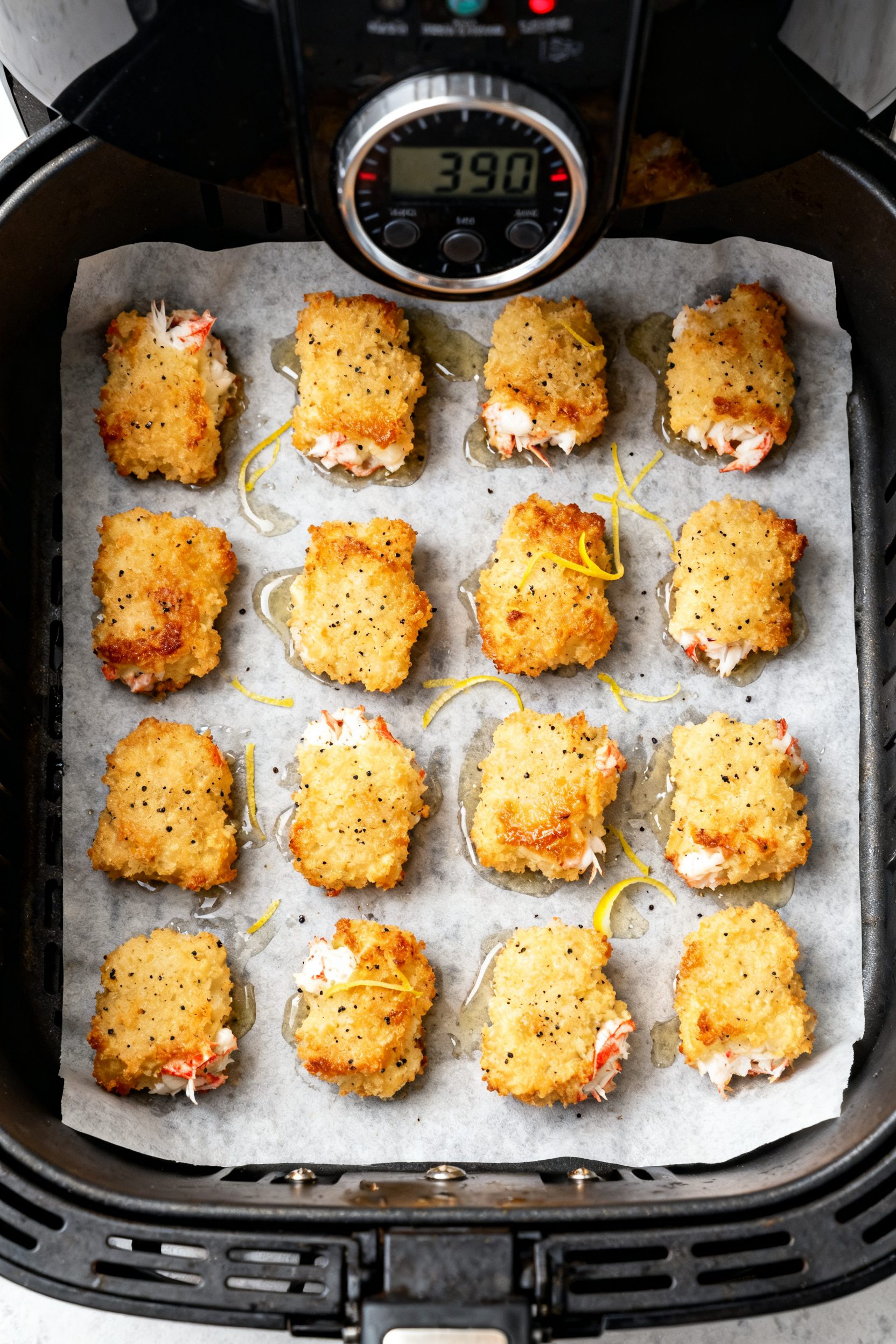Tasty top view: Overhead shot of Crab Crunchies arranged in a neat grid on parchment in the air frye