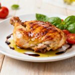 Air fryer Italian chicken with juicy roasted chicken, crispy golden skin, fresh basil, cherry tomatoes, rosemary, and a balsamic glaze, served as an easy Italian inspired dinner.